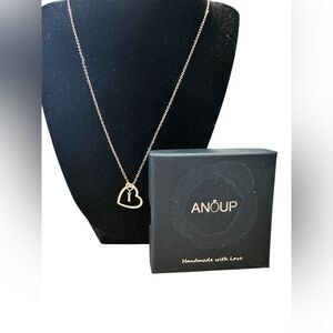 Anoup Rose Gold “I” initial necklace.